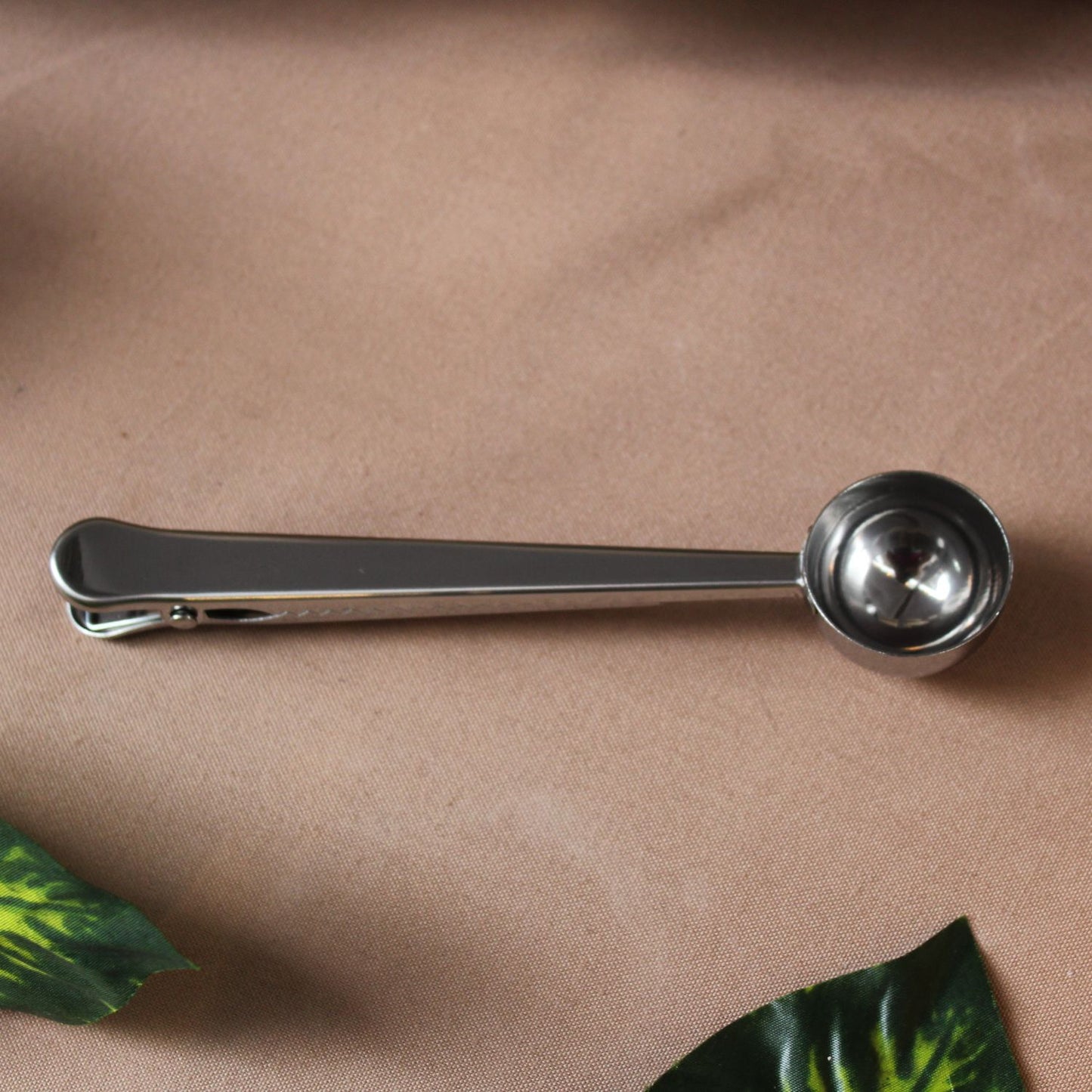 Cuchara y pinza para café
